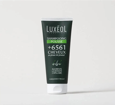 Tube of Luxeol shampoo on a white background
