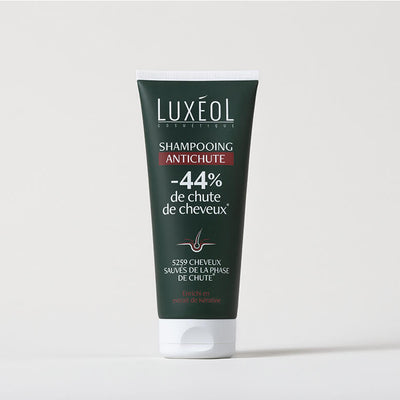 Luxéol Anti‑Hair Loss Shampoo 200 ml tube on minimal background, reduces hair loss by 44%.